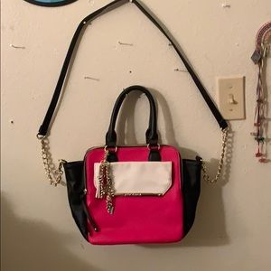 Black and pink winged triple satchel